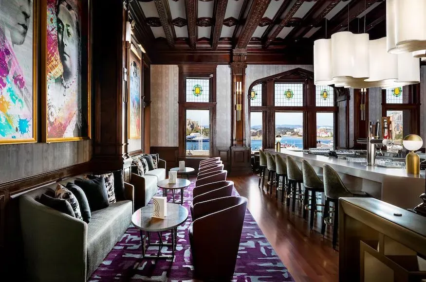 View of the q bar with harbor in background at fairmont empress